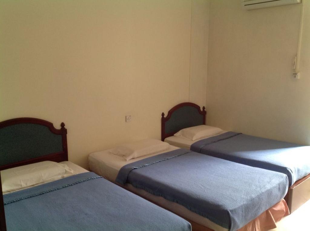 Hotel Morning Glory Kudat Habitación foto